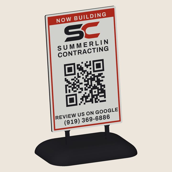 Miniature 3D-printed Summerlin Contracting job-site yard sign on a stake in a mound of dirt, with a NOW BUILDING band and a QR code