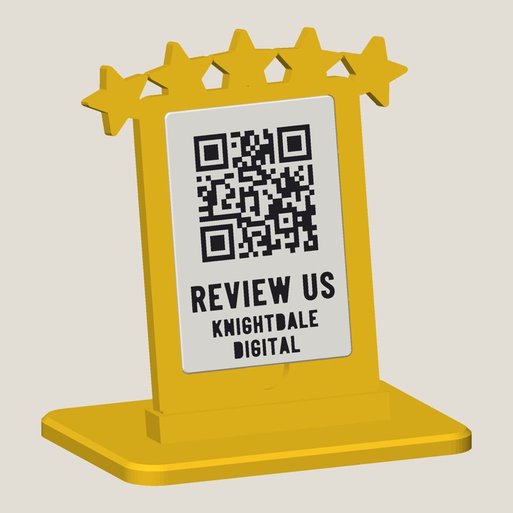 Five stars: a yellow 3D-printed QR sign with five stars along the top and a white tile reading REVIEW US